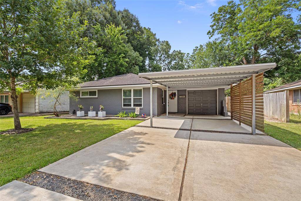 Double wide driveway and a carport that will provide shade on sunny days.