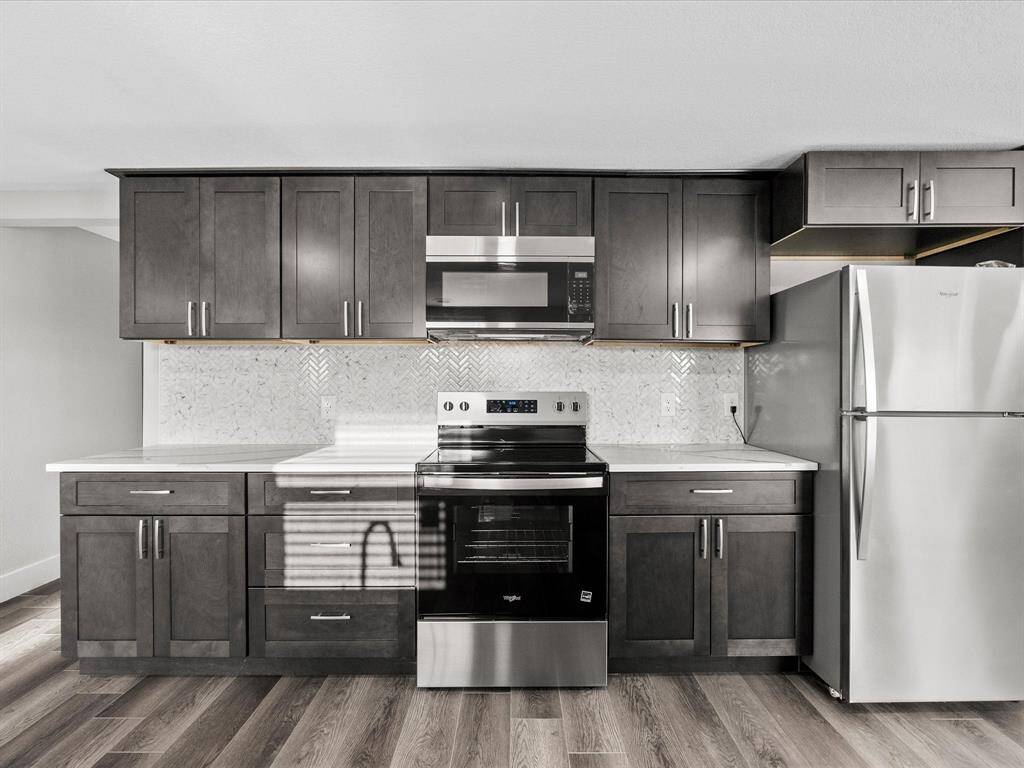 All new stainless appliances and refrigerator included.