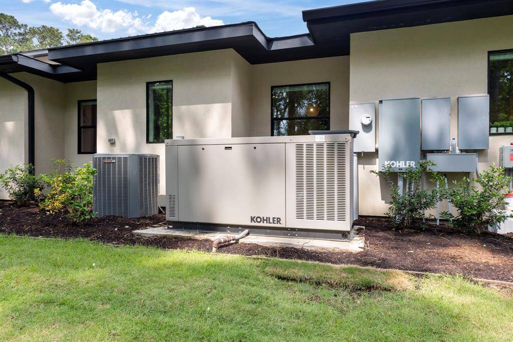 Equipped with a whole-home Kohler generator, this property offers peace of mind with uninterrupted power.