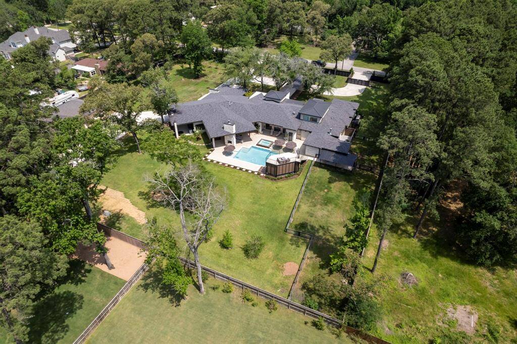 Rare location offering a peaceful acreage retreat offering privacy and seclusion.