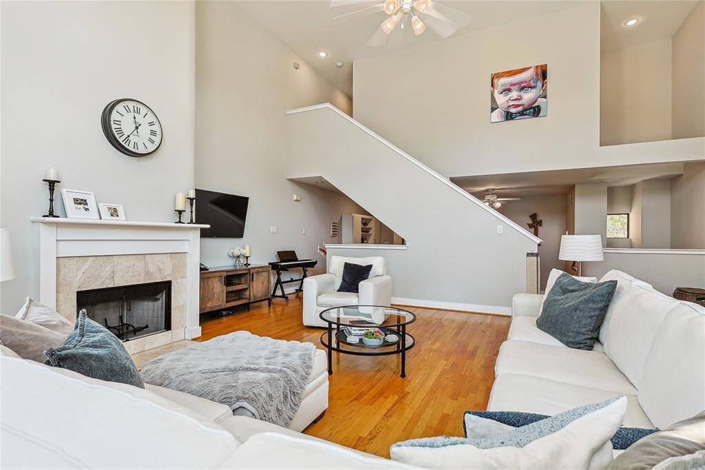 Another view of the spacious living area and soaring ceilngs