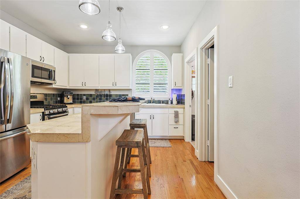 Extended countertop with bar height seating