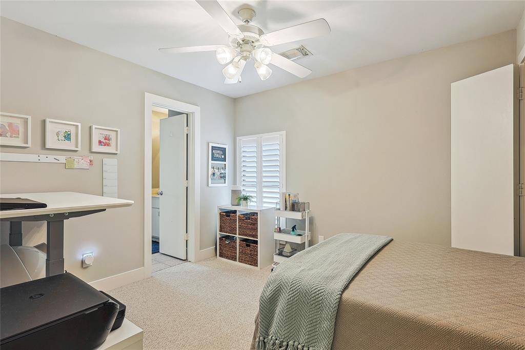 Inviting entryway with tile flooring and staircase leading to the main living area