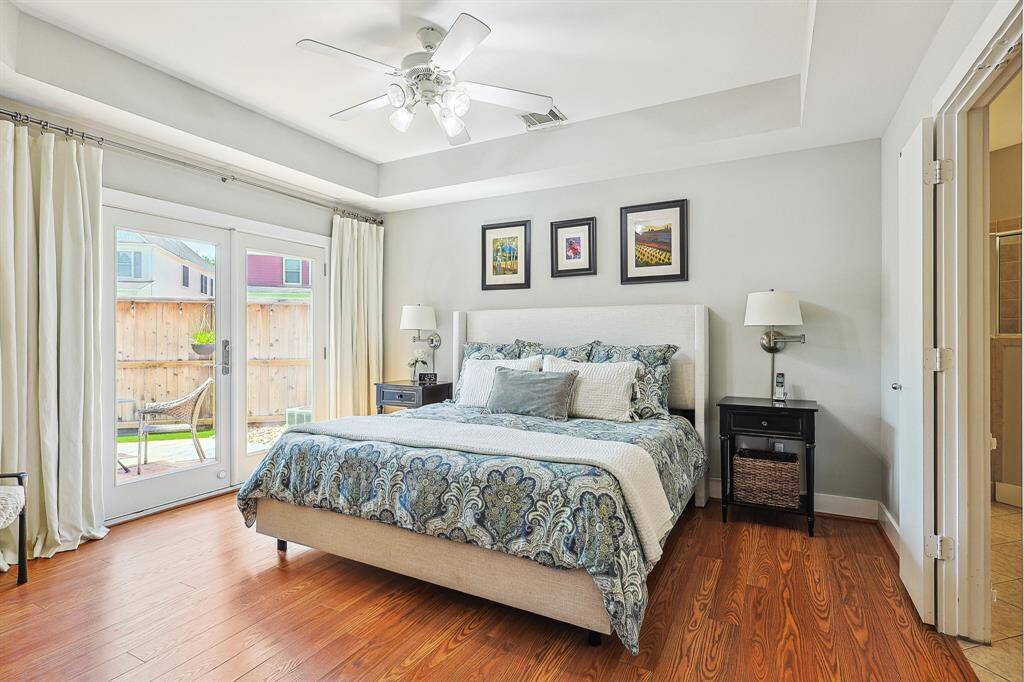 Light and bright primary bedroom with direct patio access
