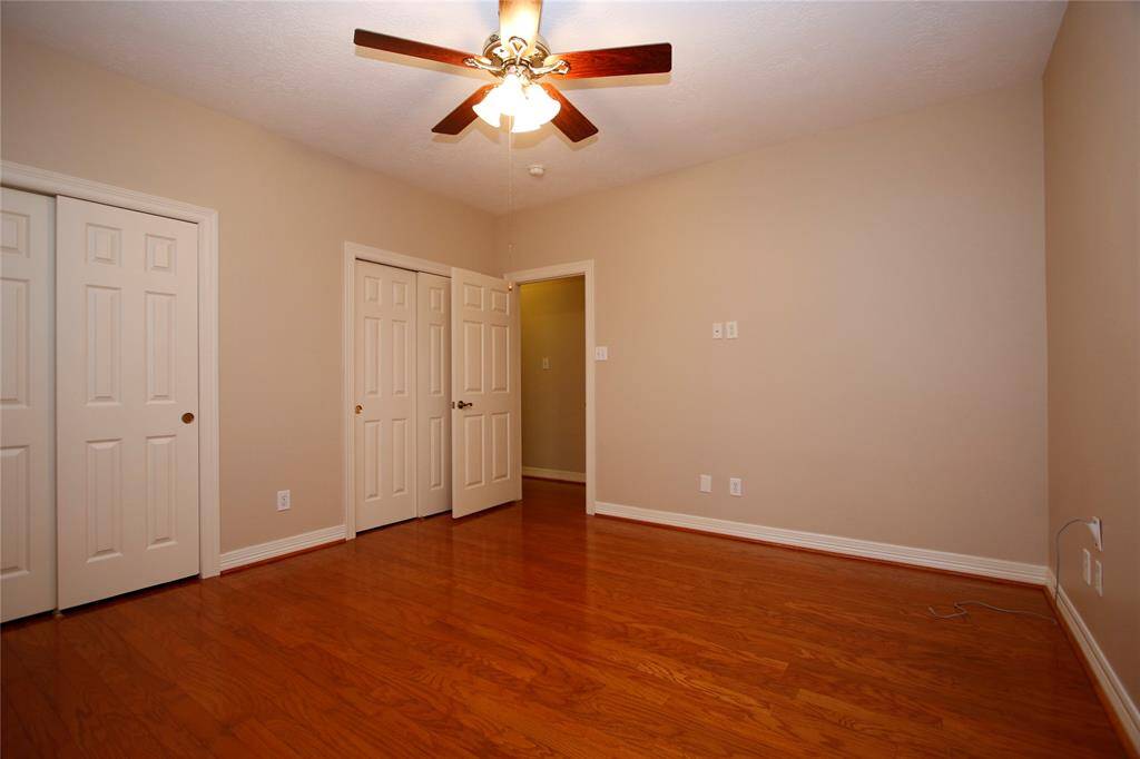 Second of the secondary bedrooms is 13 x 13 and also features two large closets that span the width of the room.