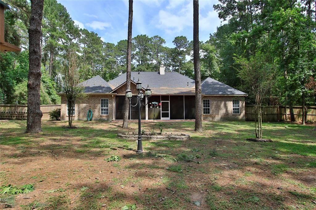 Not featured in the photo but just outside the gate on the right is a whole house ARK generator.  No power outages for you.