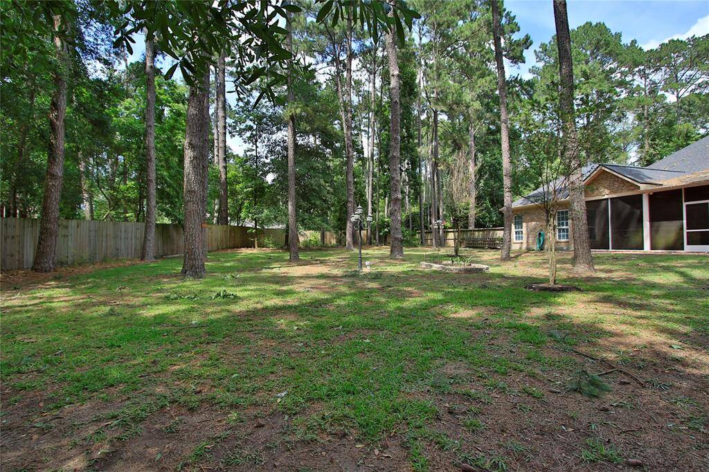 The back is fully fenced and has a double wide gate from driveway to back area.