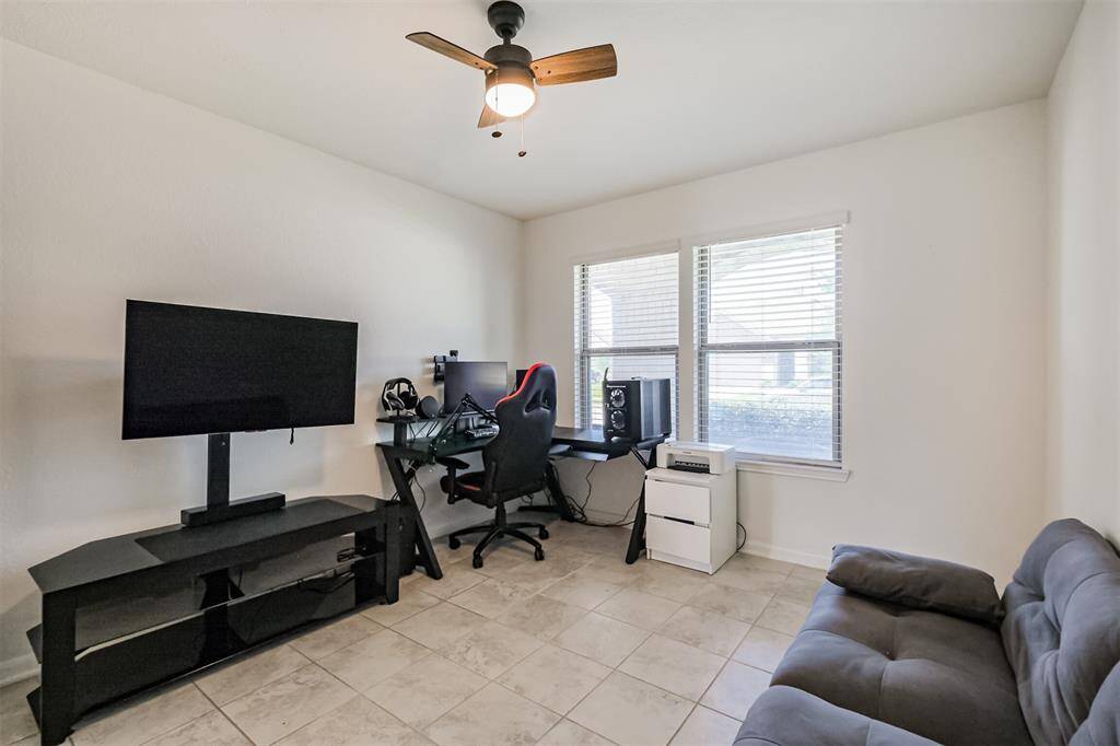 Welcome to your future guest suite, home office, or private study- right on the main floor next to the entrance