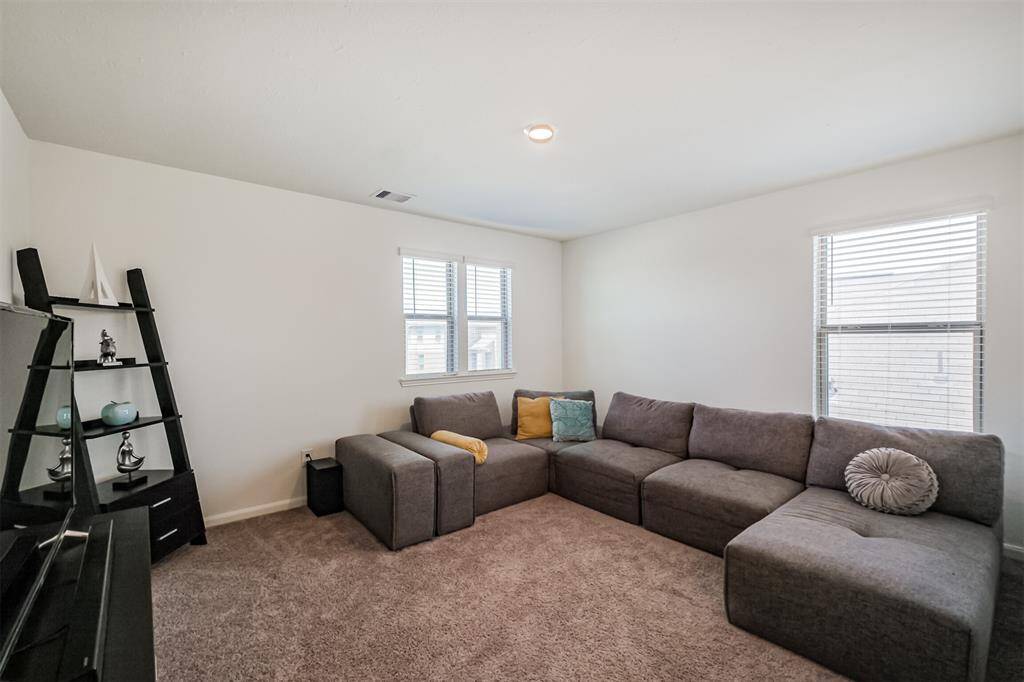 Filled with natural light and just steps from the bedrooms, this is the perfect hangout space for the whole family.