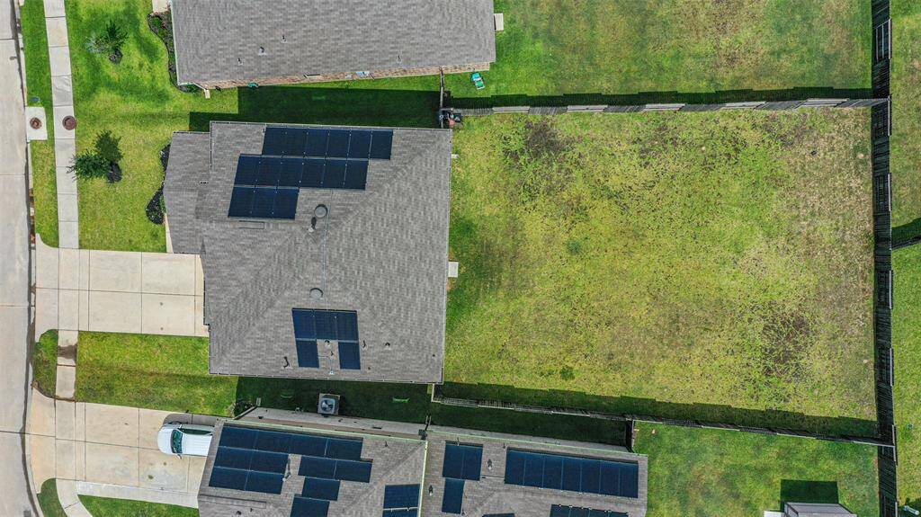 Take in a full view of your future property from above- These aerial shots show just how much space you'll have front and back!