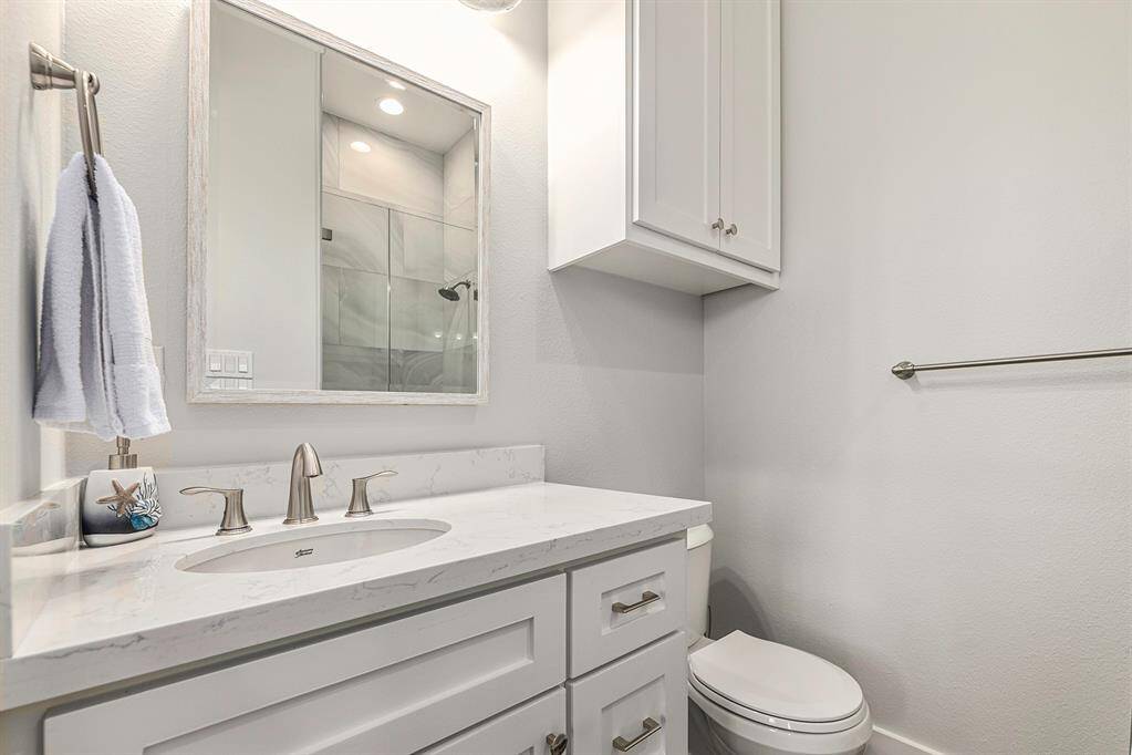 Full bath attached to downstairs bedroom.