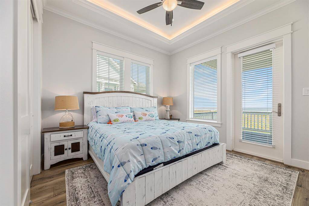 King size bedroom #2 on second floor with entry to balcony.