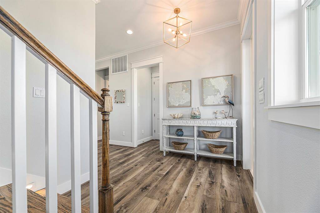 Beautiful front entry with access to the stairs.