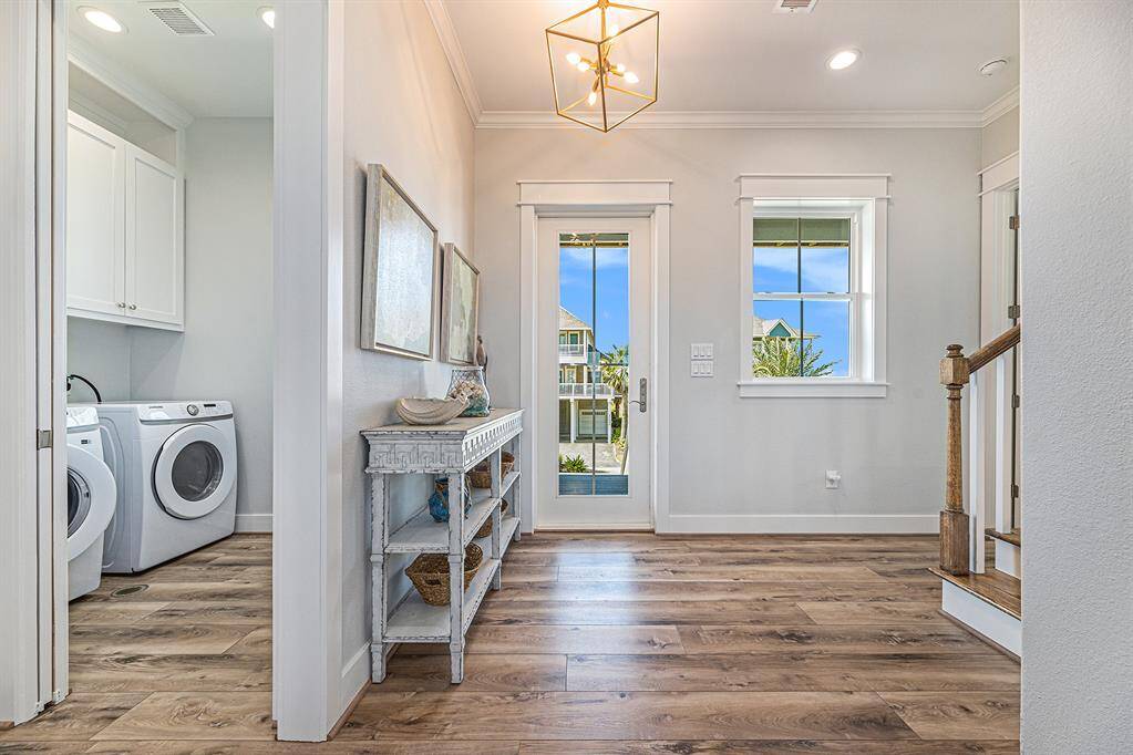 Front entry door, downstairs laundry room access.