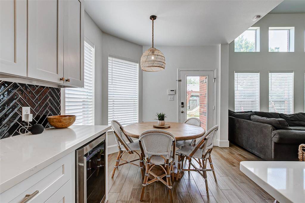 An added bonus to the impressive stainless steel appliance suite is the built-in wine fridge, conveniently located near the breakfast area, perfect for keeping your favorite bottles at the ideal temperature.