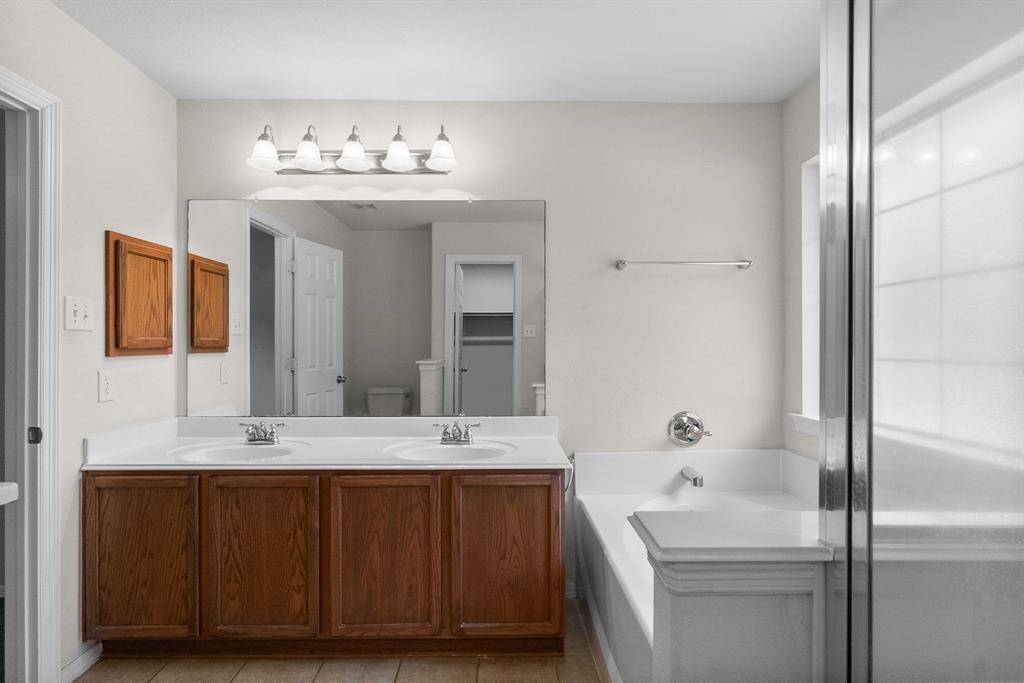Double sinks in primary bathroom.