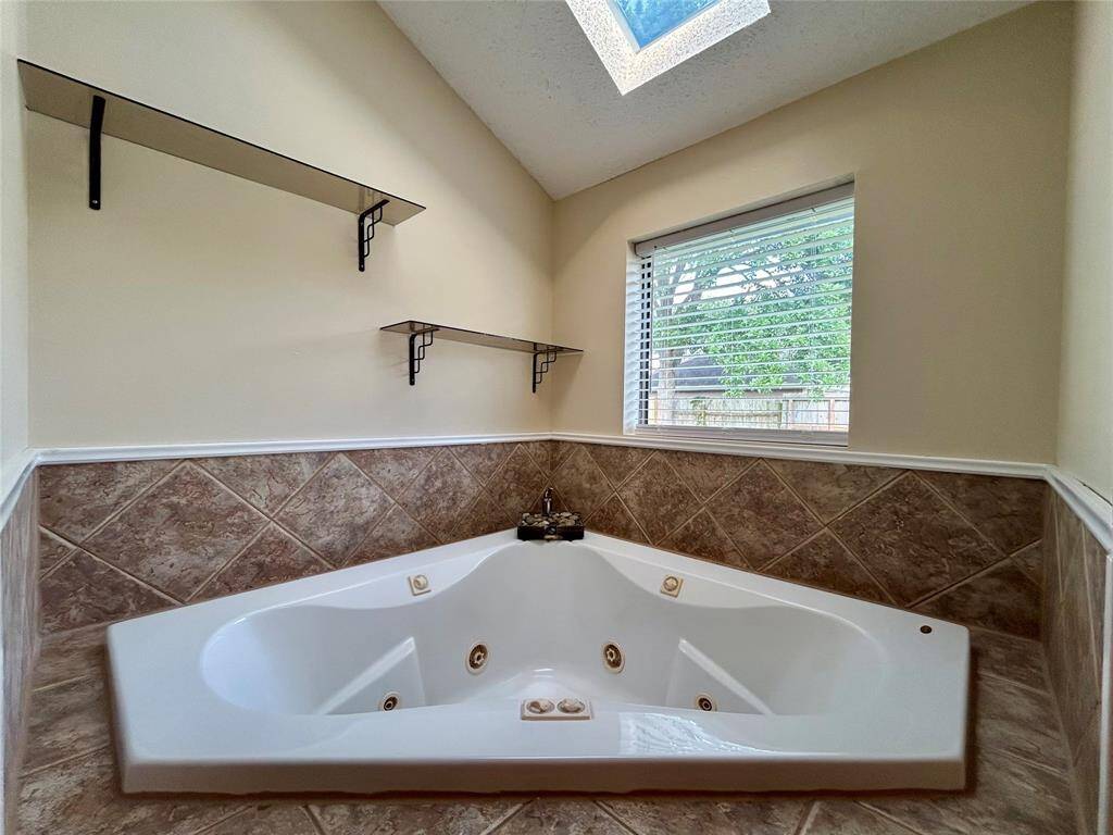 Jacuzzi tub in primary bath.