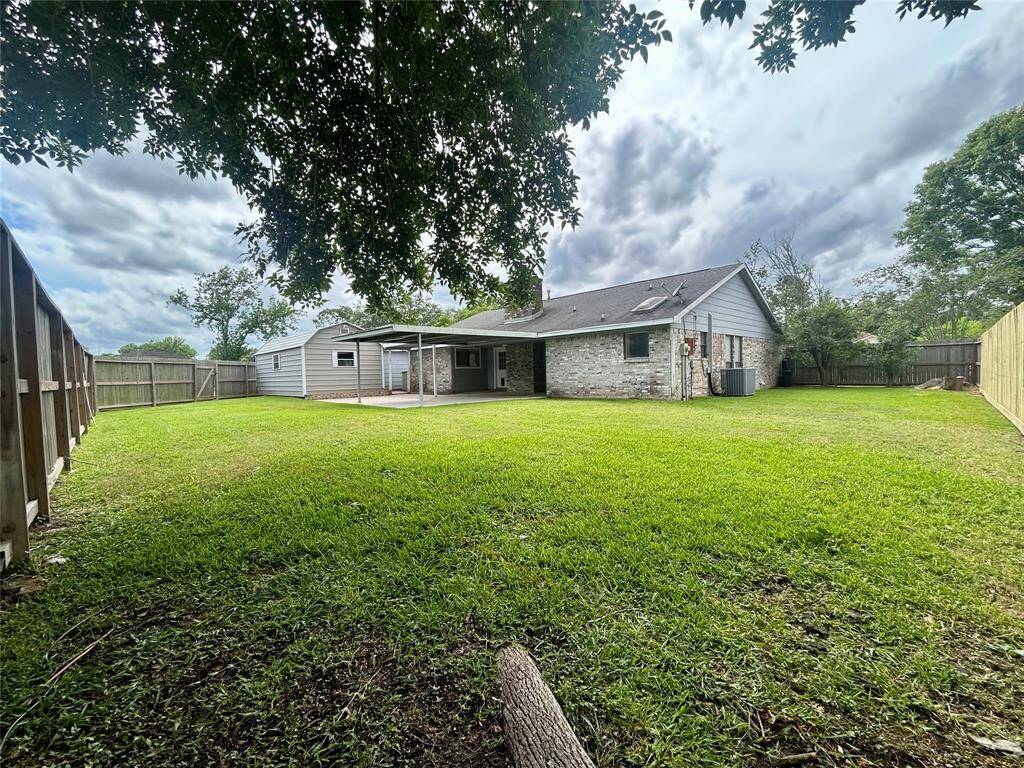 Large fenced back yard.