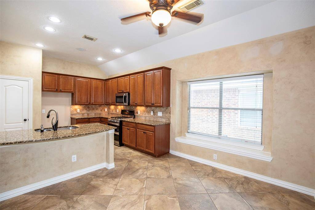 The dining area has enough space for a large table.
