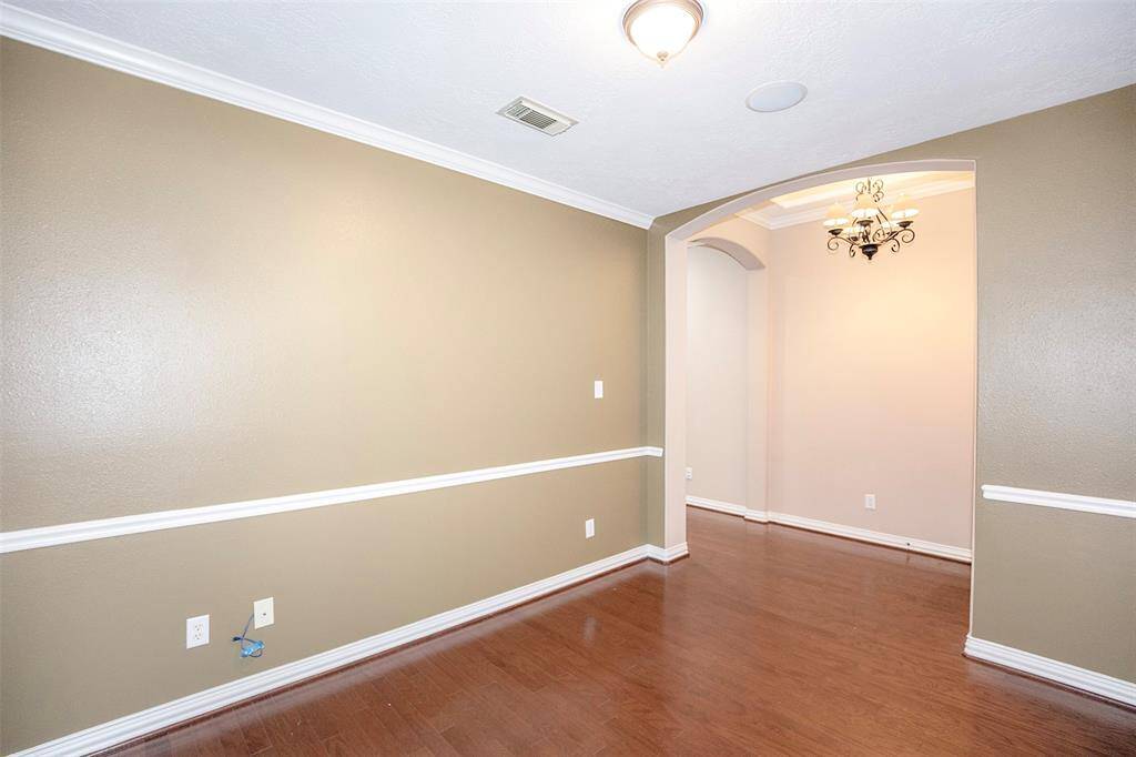 This wonderful space opens to the entryway.