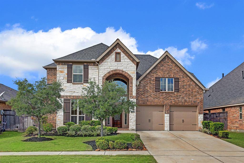 Beautiful stone and brick Perry Home