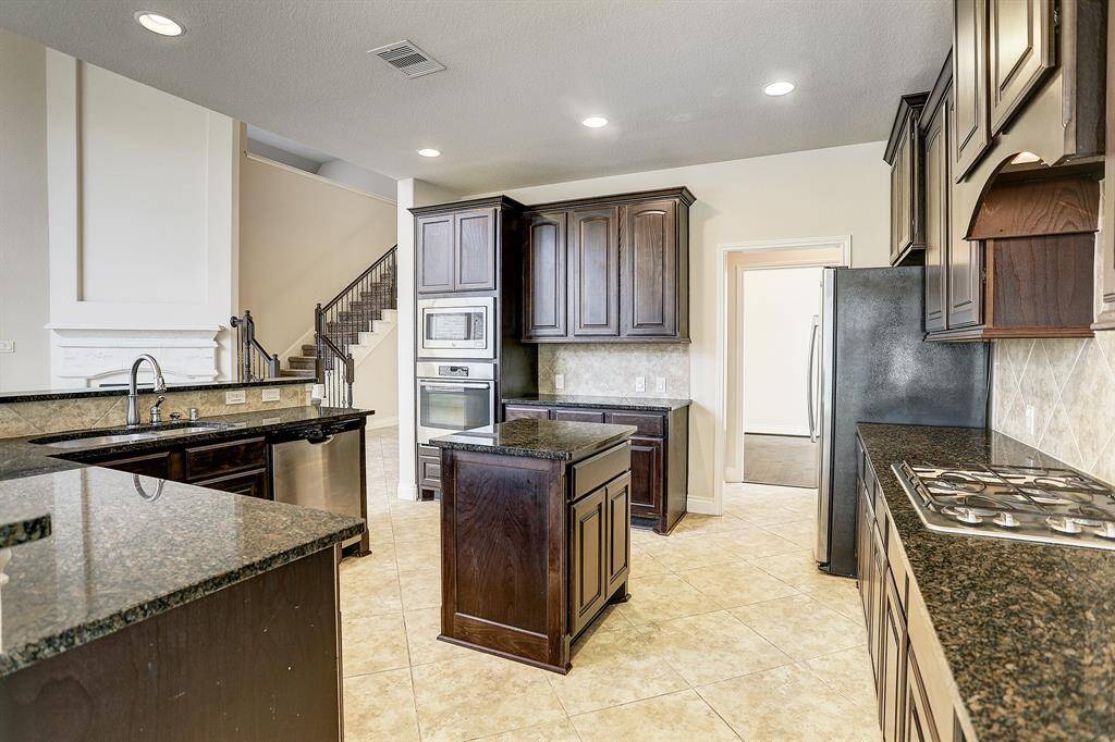 Pantry is between the dining and kitchen along with the butler's pantry