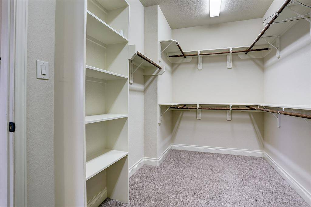 One of 2 primary closets