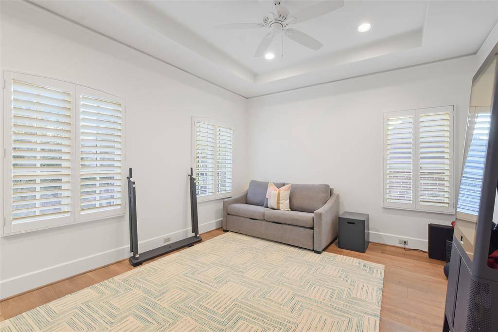 Secondary bedroom currently being used as a workout room.
