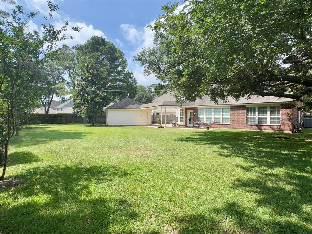 Large backyard… perfect for backyard BBQ‘s. Could easily fit a pool.