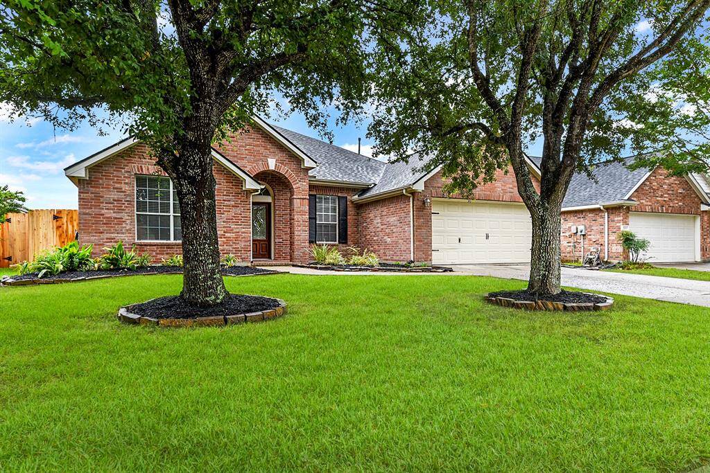 Mature trees, a new fence surrounding the entire property with gates on both sides, and a new roof—this home is move-in ready.