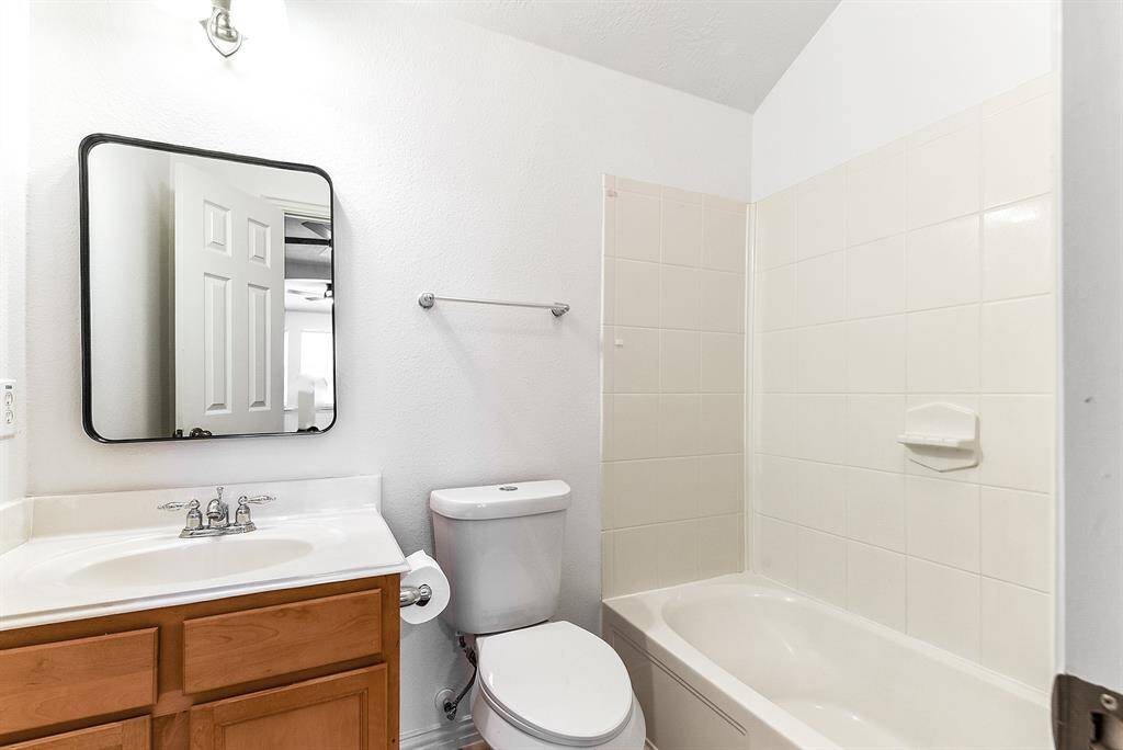 Upstairs features a full 3-piece bathroom with a tub and shower combo.