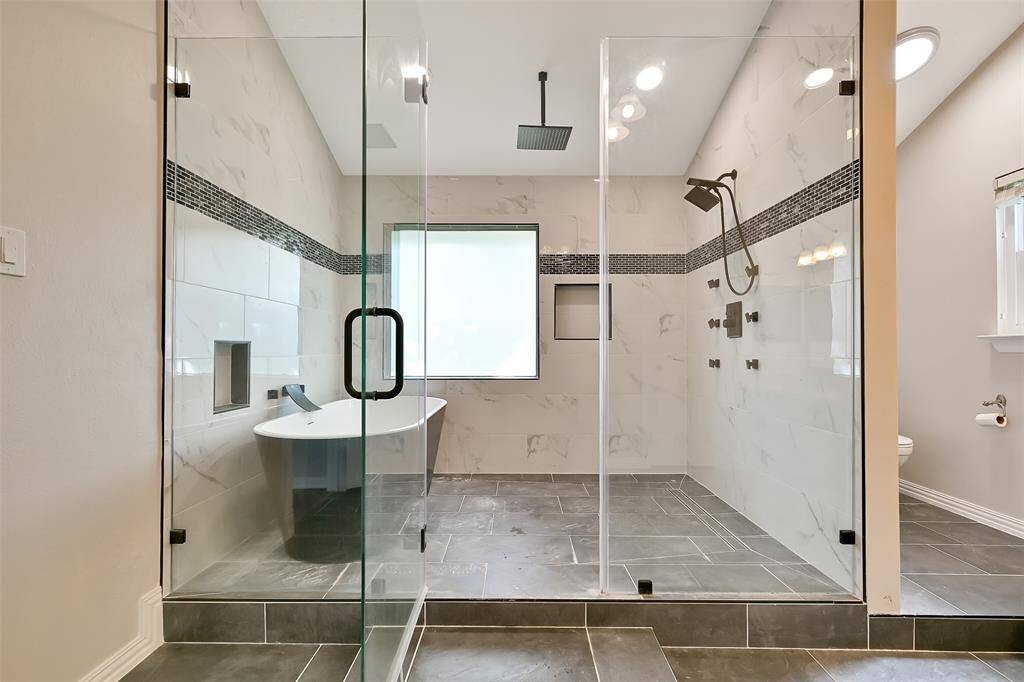Enormous walk in shower and tub area!