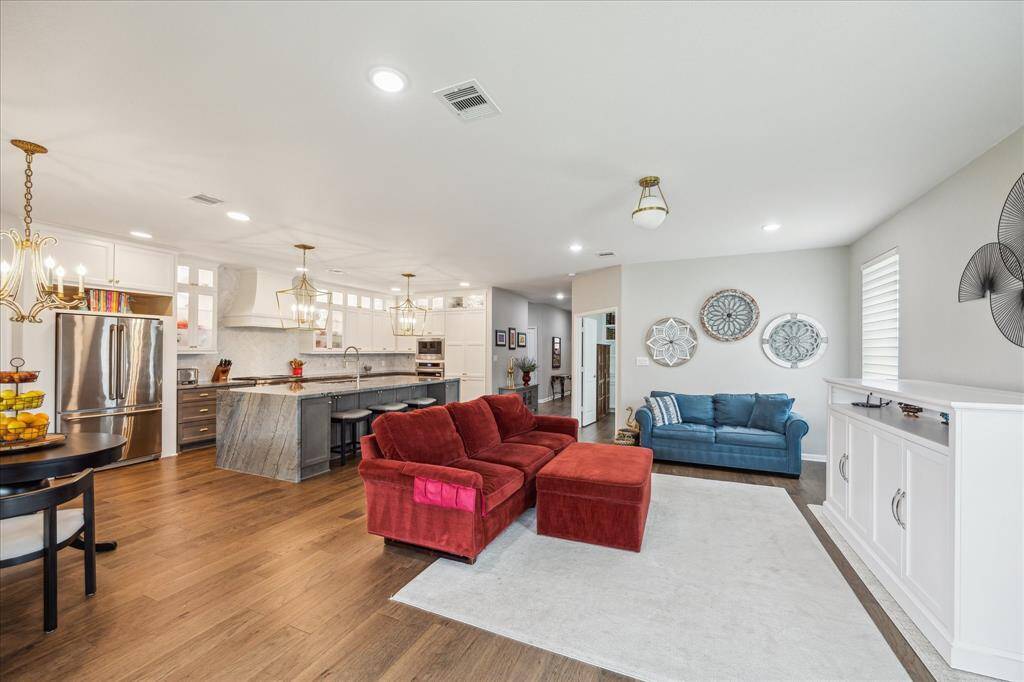 The open concept floor plan affords easy entertaining and relaxed family living.  Open yet defined spaces include a  large family room, breakfast room and kitchen.