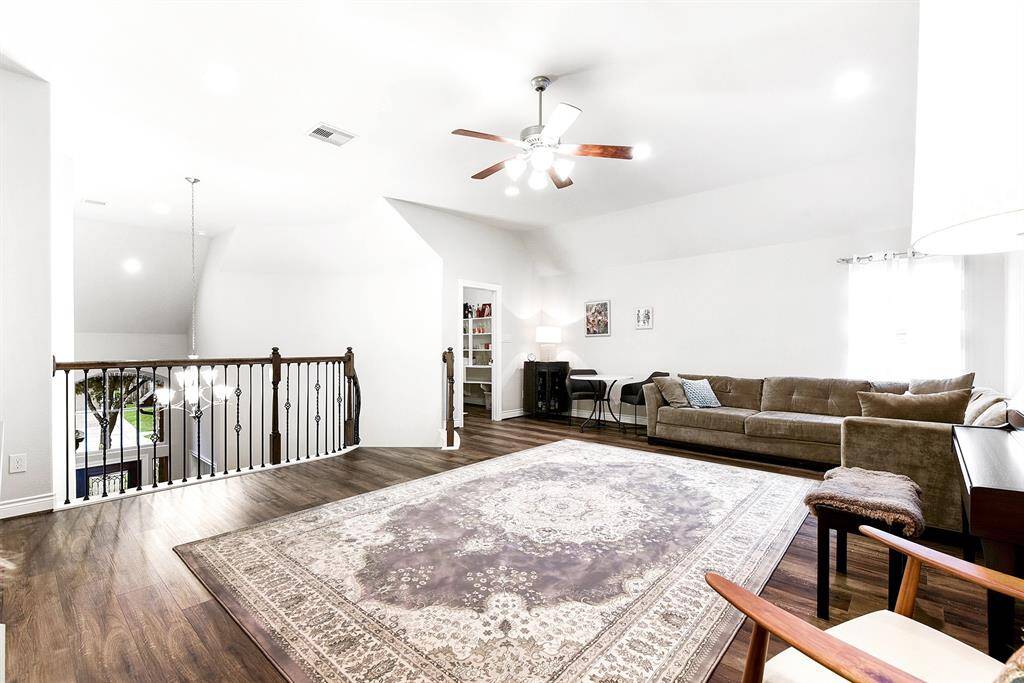 This game room is enhanced by its high ceilings and carpet-free flooring throughout the entire home. The upstairs game room also offers the largest storage closet in the house.
