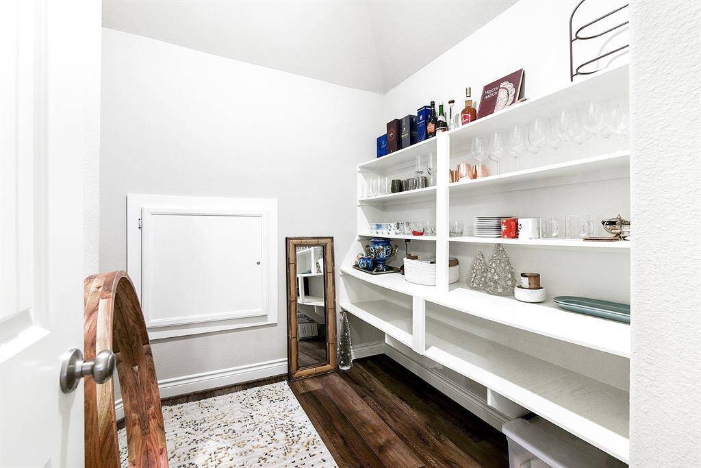The large closet in the upstairs game room features built-in shelving, making it perfect for storing games, extra linens, or seasonal items.