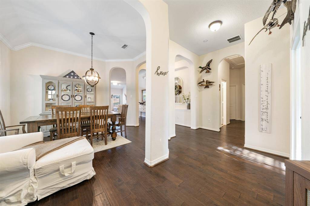 Nice open floor plan with formal dining and wood floors throughout.