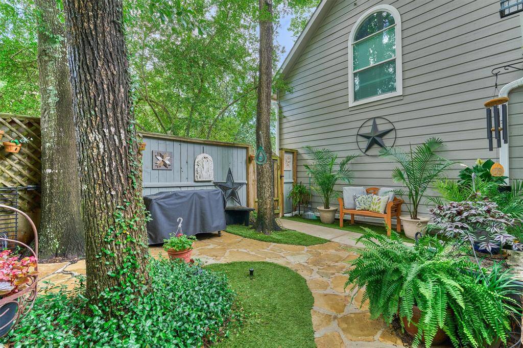 Corner lot boasts expansive side yard - perfect for grilling and outdoor entertaining.