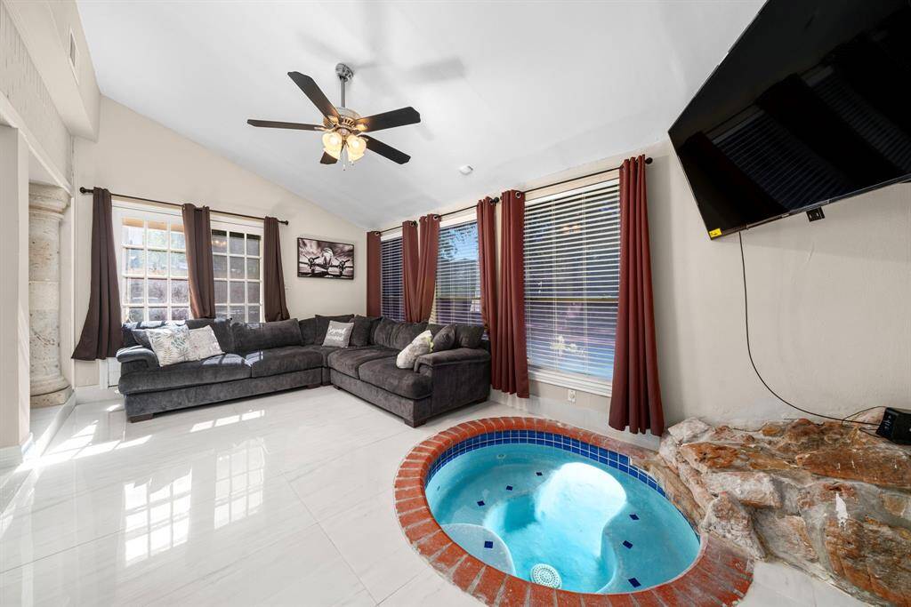 Back room with interior hot tub perfect for relaxation