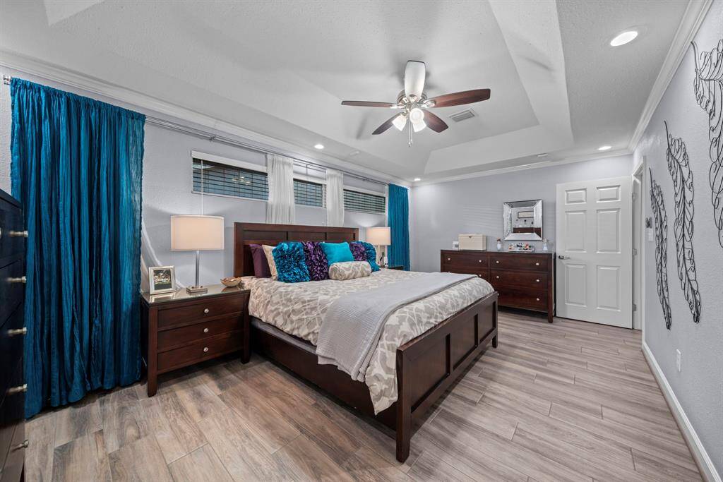 Trey ceiling adds height to your primary suite