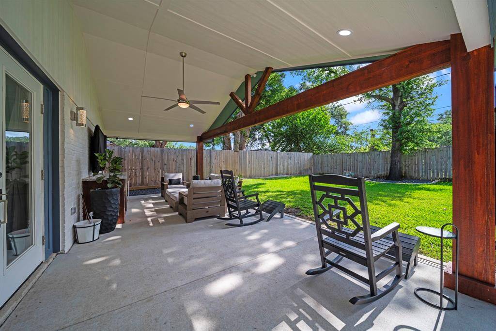 Sit back and relax rain or shine with this spacious covered patio