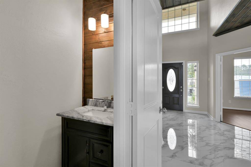 Half bath near the front, Office and Dining Room