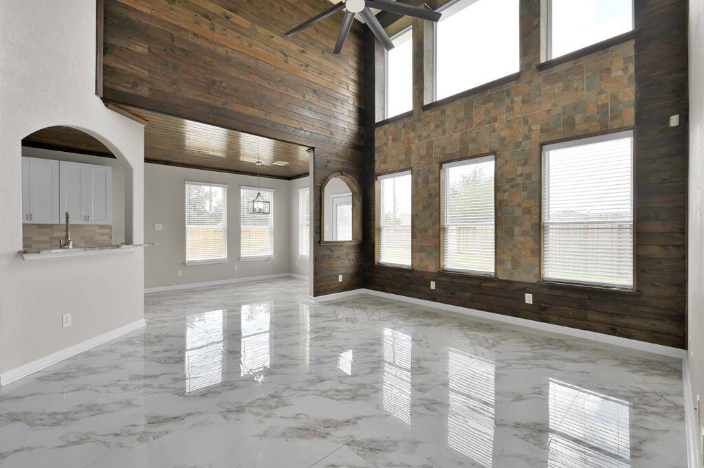 Living Area. Breakfast area ahead. Lots of windows to brighten the home.
