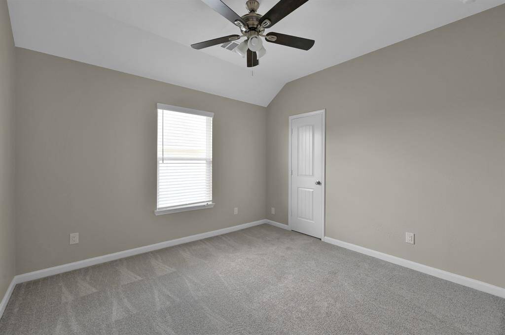 Bedroom 2 with ceiling fan.