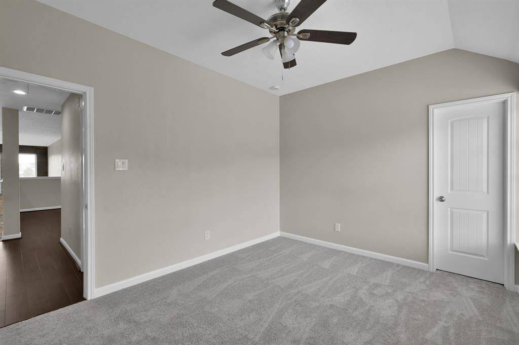 Bedroom 3 with ceiling fan.
