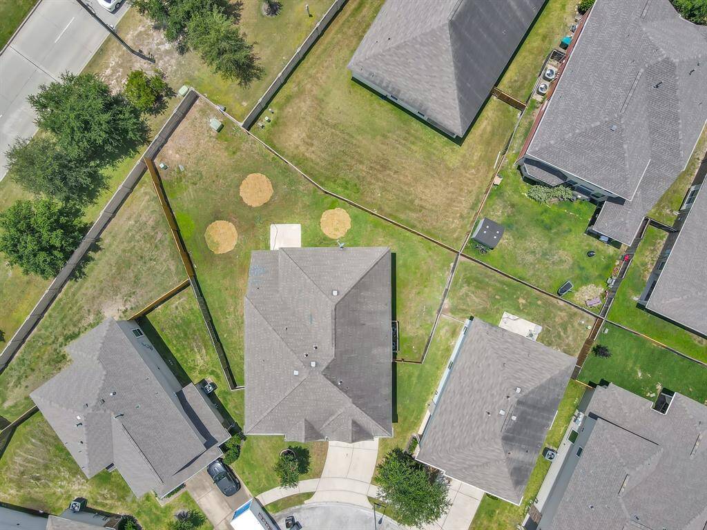 Larger back yard area can be seen from this aerial photo.
