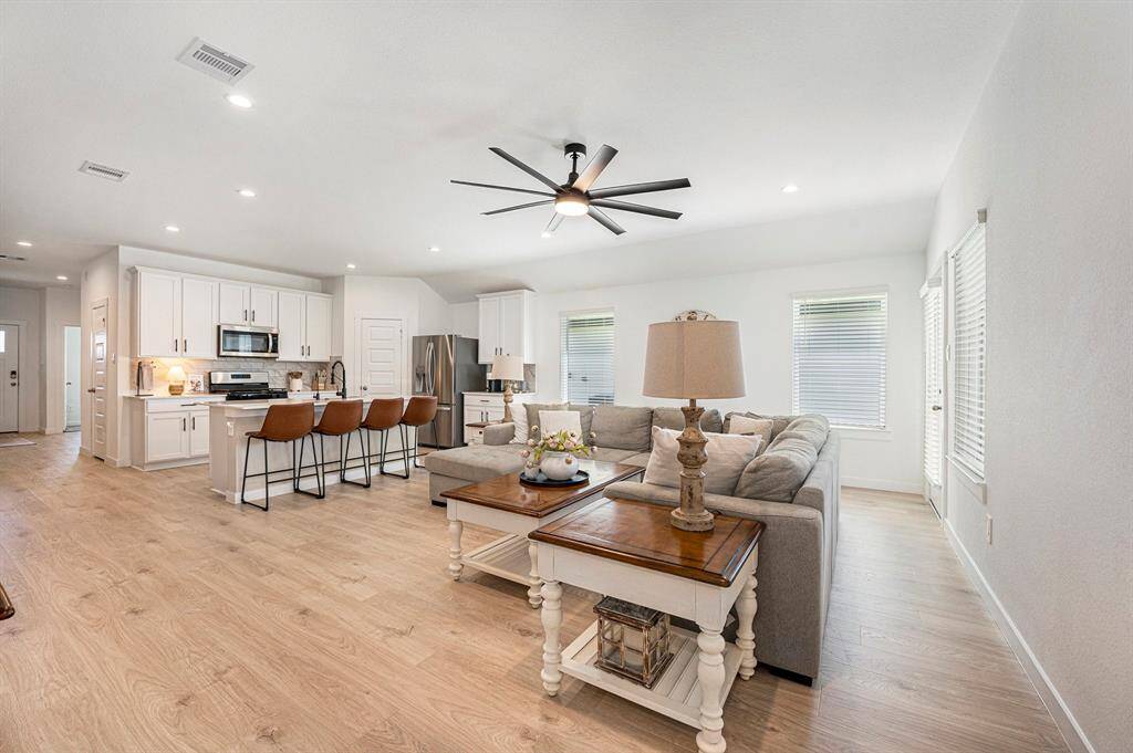 Don't miss what's going on in the living room while you're cooking - perfect for entertaining