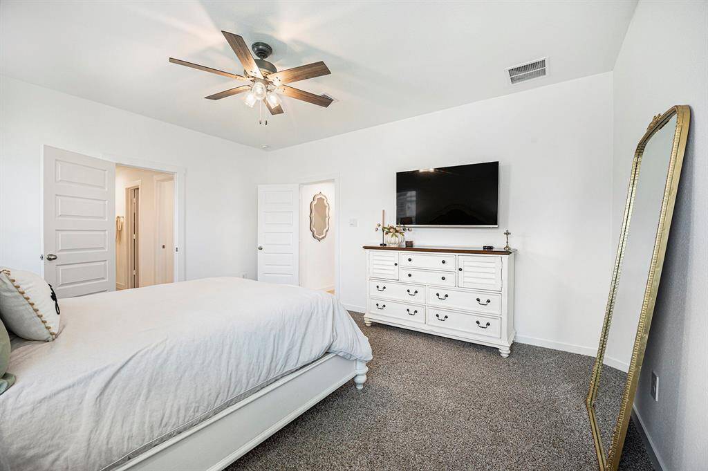 This spacious owner’s retreat is a beautiful space to begin and end your day.