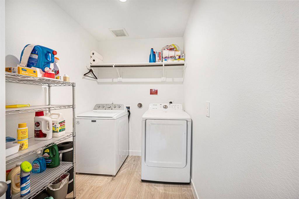 Bright and functional laundry room designed to make household chores quick and convenient.
