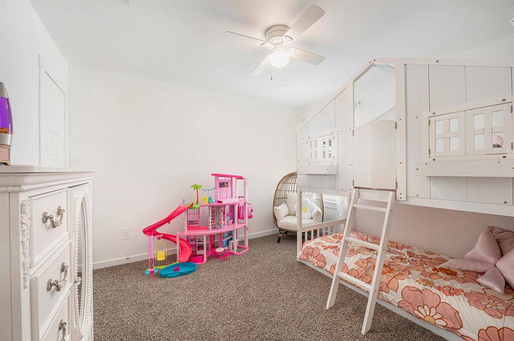 Retire to this charming bedroom and enjoy a quiet, delightful space all your own.
