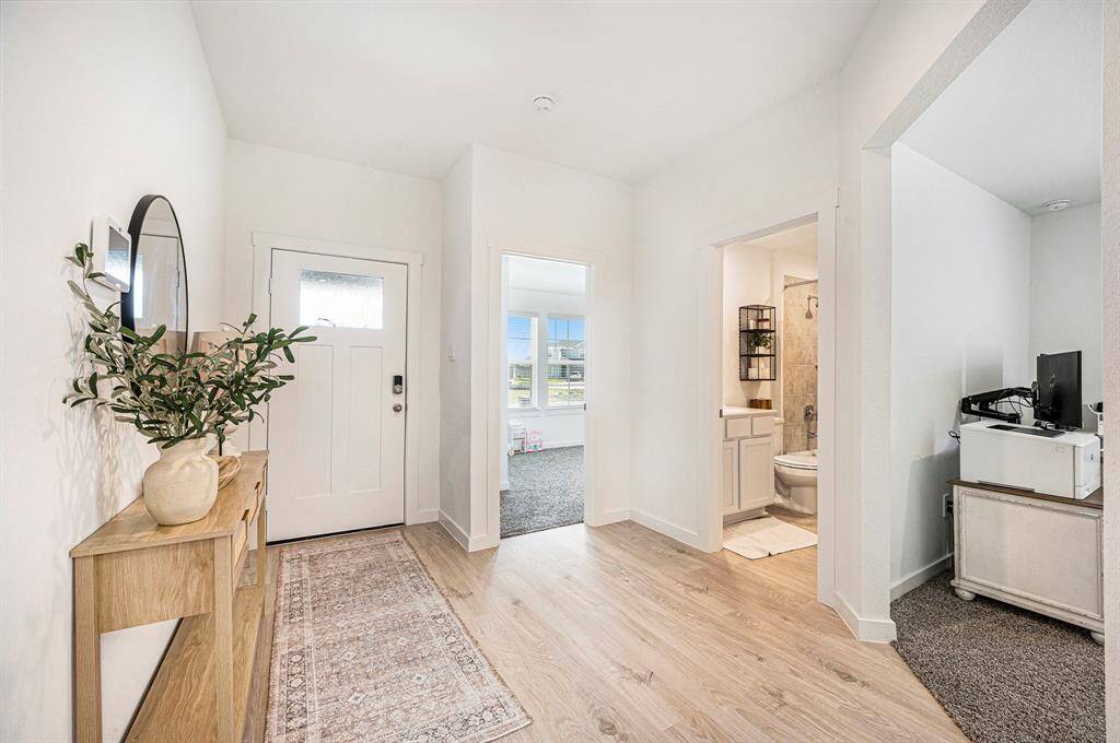 Welcoming front door entryway with access to the bedroom, bathroom, and study just off the entry—creating a functional and inviting first impression.